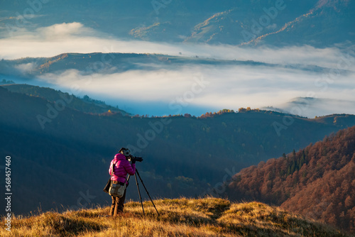 Professional photographer with tripod