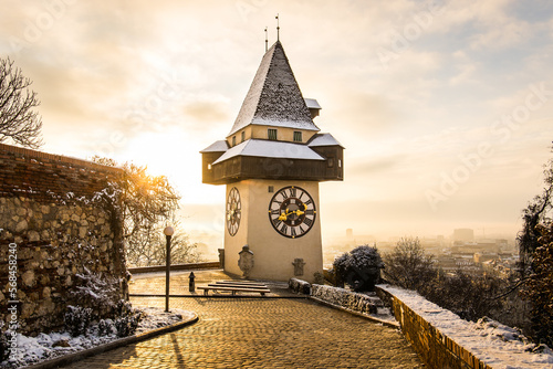 Morning in Graz at the Uhrturm landmark at the Schloßberg in a tranquil mood photo