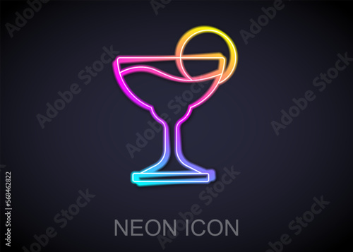 Glowing neon line Margarita cocktail glass with lime icon isolated on black background. Vector