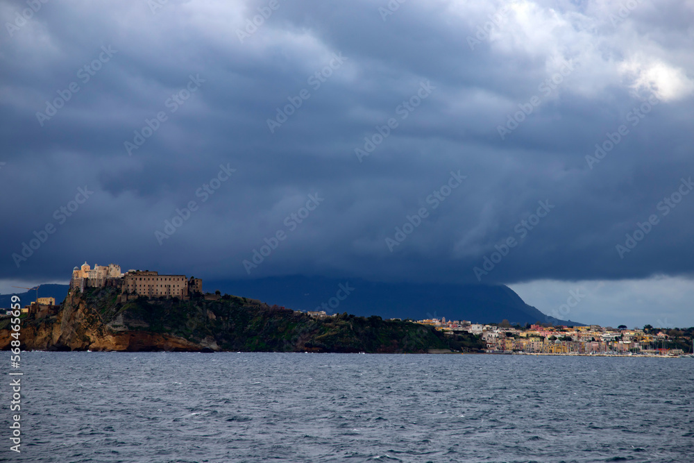 Procida Island on a rainy day with dramatic clouds
