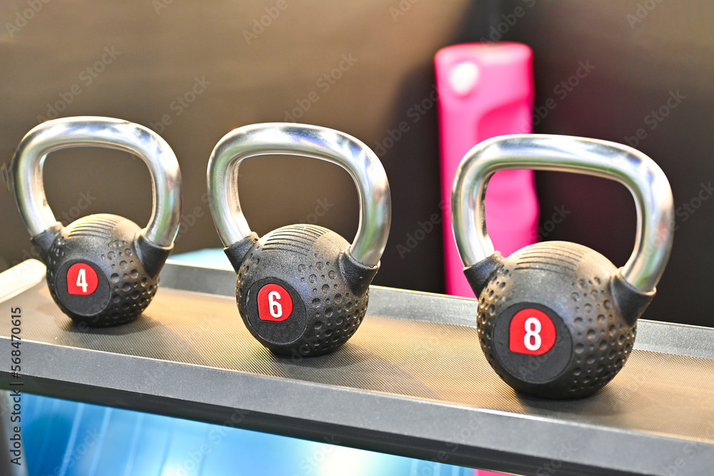 Rack with sports kettlebell weights kilograms of weight, equipment for