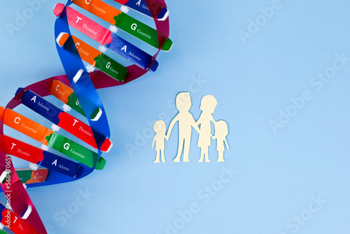 DNA helix structure and family paper model. Parents and children. DNA carrier status. Healthcare, science and medical concept.