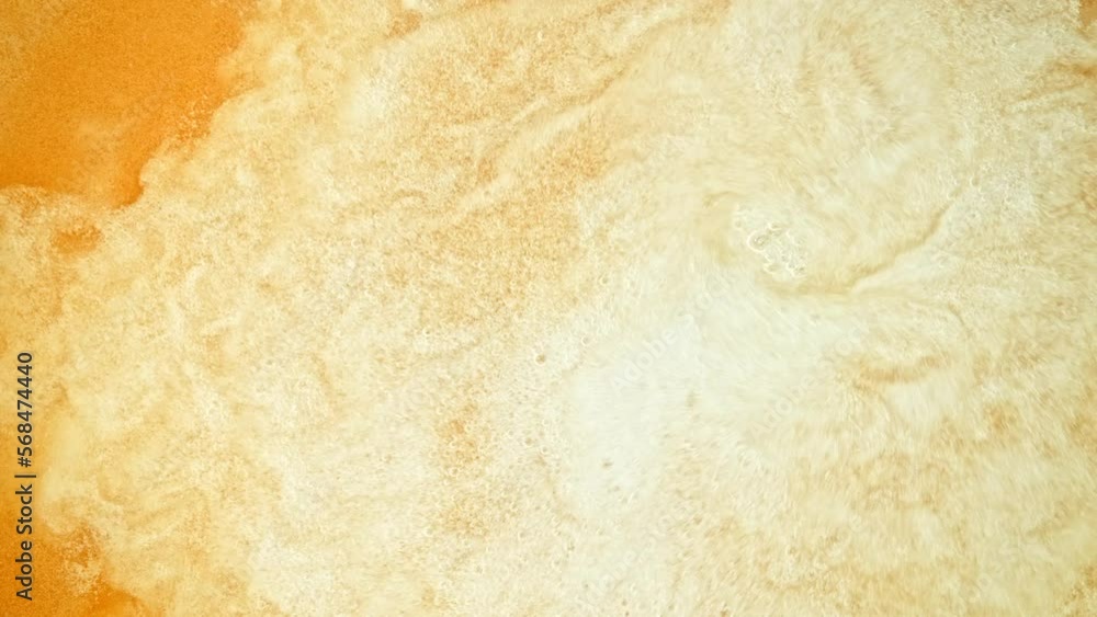 Super Slow Motion Shot of Fresh Beer Background at 1000fps. Super Slow Motion Shot of Fresh Beer Background at 1000fps.