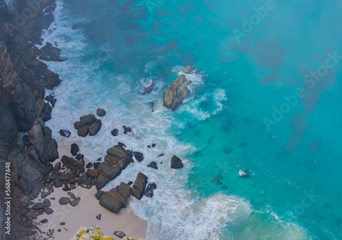 cliffs and turquoise sea at the Cape of Good Hope in South Africa