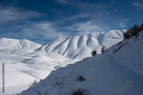 Monte Vettore and Piana di Castelluccio covered with fresh snow. The concept of strong powerful nature is expressed with a sense of freedom and silence photo