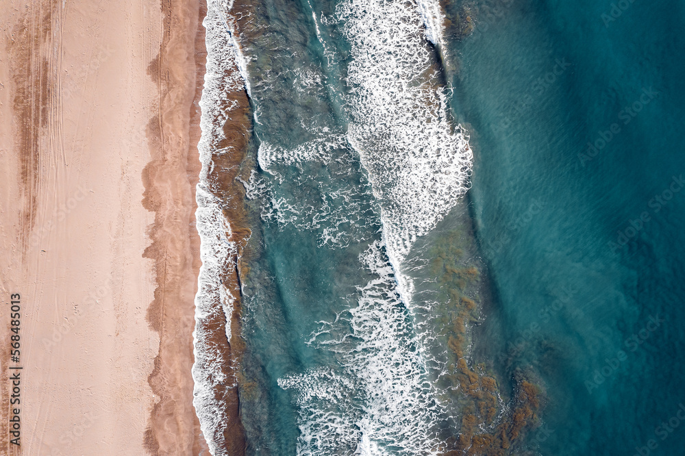 Naklejka premium Beautiful sand beach and blue sea view, aerial top drone. Concept travel Turkey