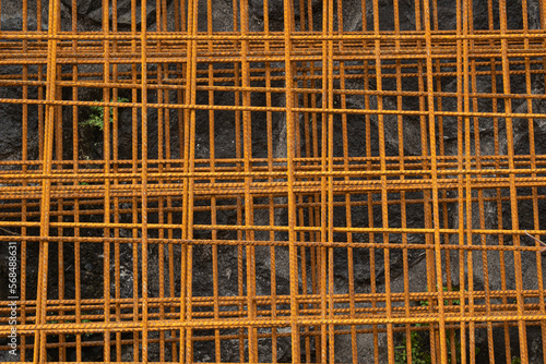Rusted pile of iron construction gates texture