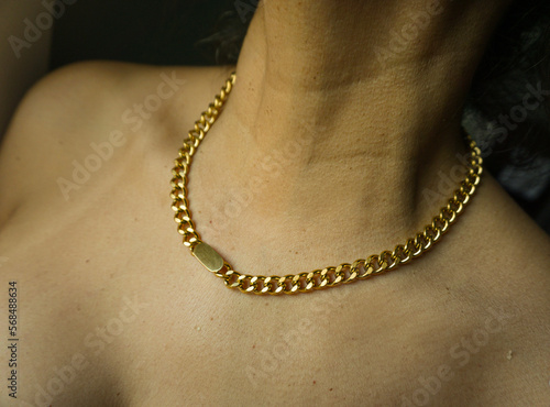 woman's neck with collar bone golden chain female body neck bones close up tanned brown skin jewelry fashion blogger new design fashion item chain necklace golden sunshine 