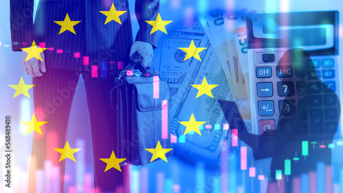 Calculator with money near flag Europe. Business investment in European Union. Businessman with briefcase doing business with European countries. Investment in EU. Eurozone financial market photo