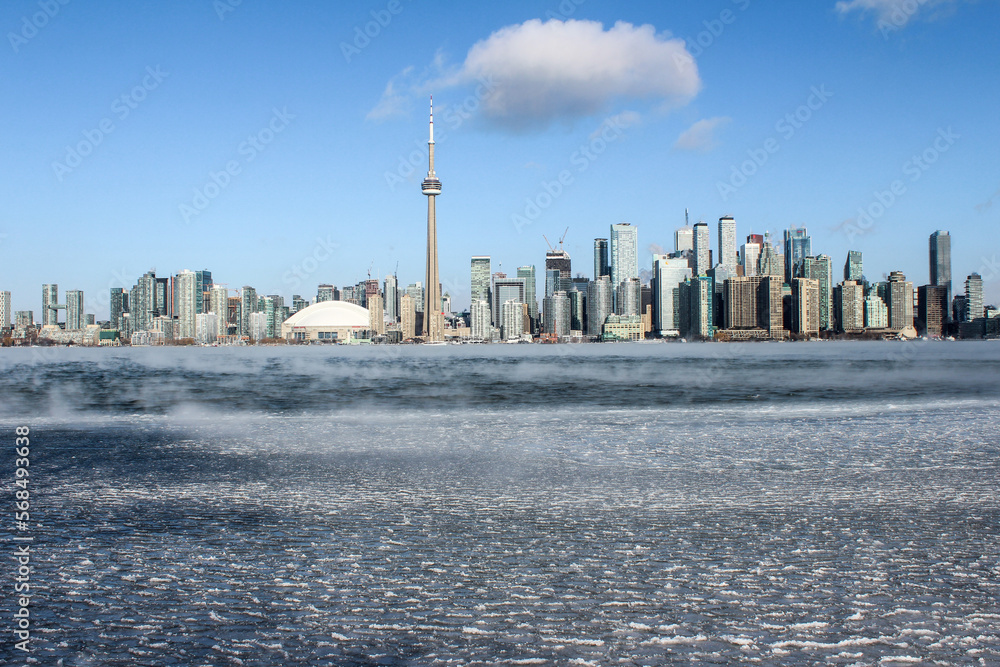 Toronto skyline in winter with frozen lake in 2023