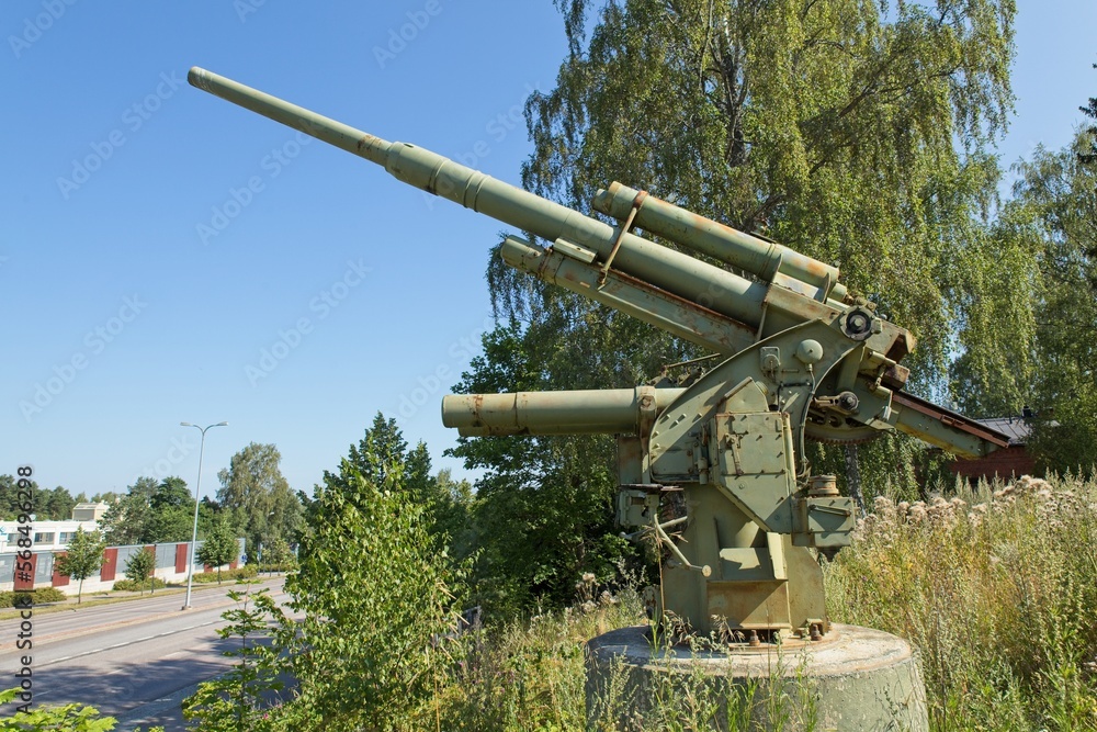 WW2 anti-aircraft gun memorial at Hyrylä in clear weather in summer, Tuusula, Finland. WW2 anti-aircraft gun memorial at Hyrylä in clear weather in summer, Tuusula, Finland.