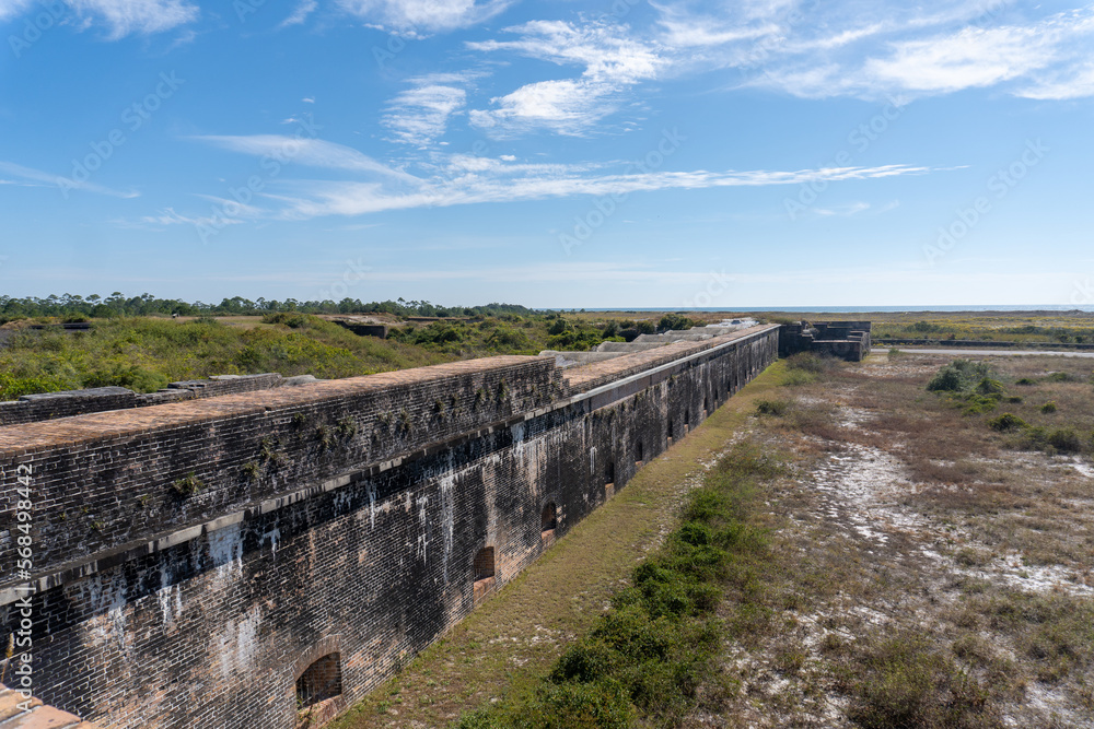 Fototapeta premium Gulf Islands National Seashore along Gulf of Mexico barrier islands of Florida. Fort Pickens pentagonal historic United States military fort on Santa Rosa Island. 