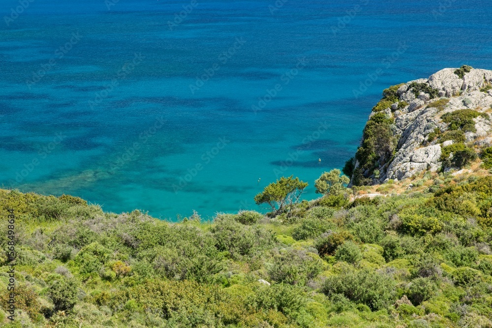 Landscape view with clear water in sunny weather from Kolymbia Rock near Kolymbia, Rhodes, Greece.
