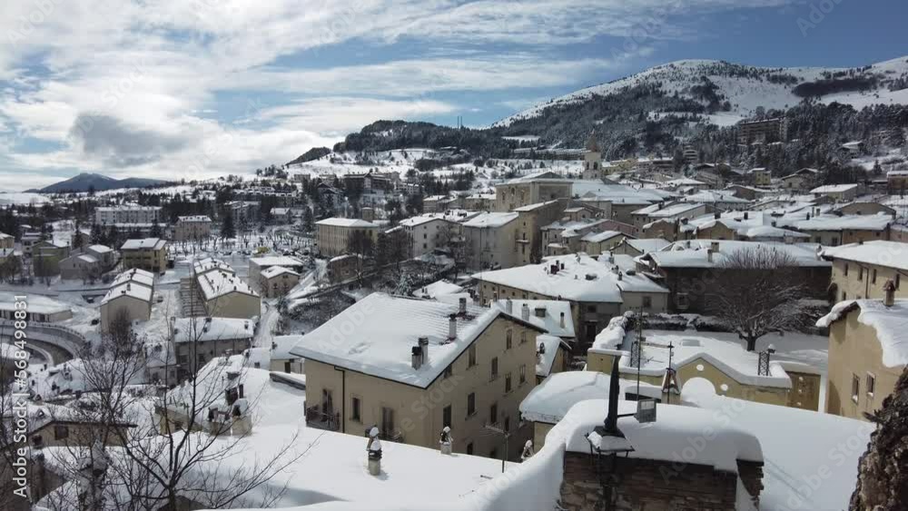The beautiful village of Pescocostanzo covered in snow during winter time. Abruzzo, central Italy. The beautiful village of Pescocostanzo covered in snow during winter time. Abruzzo, central Italy.