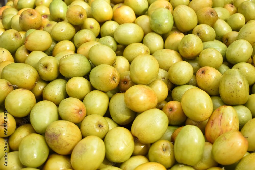 A closeup view of a Indian Plum or Jujube, which is a unique tropical Fruits for Fruit texture