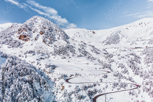 Wallpaper Mural Vallter 2000 ski resort. Aerial winter landscape with a very winding road. Setcases, Ripollés, Girona Pyrenees, Catalonia. Vacations, travel, nature and tourism concept. Torontodigital.ca