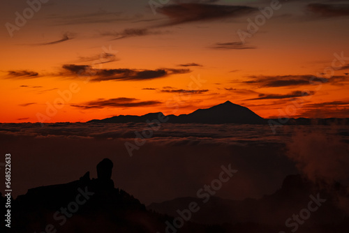 Spectacular sunset above the clouds of the Teide volcano national park on Tenerife. Sunset from the top of Gran Canaria Island. Pico de las Nieves. © Aerial Film Studio