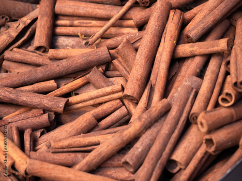 Cinnamon sticks piled up in Marrakech market Morocco