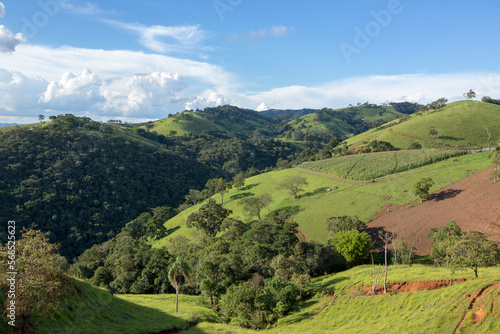 View of the green hills of Serra da Mantiqueira in the state of Minas Gerais, Brazil