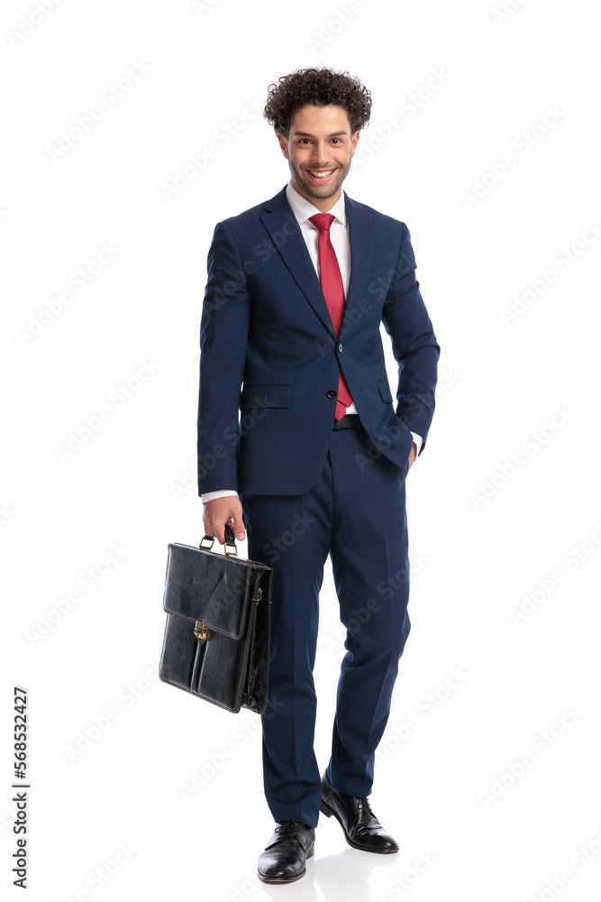 full body picture of turkish businessman with hand in pocket smiling full body picture of turkish businessman with hand in pocket smiling
