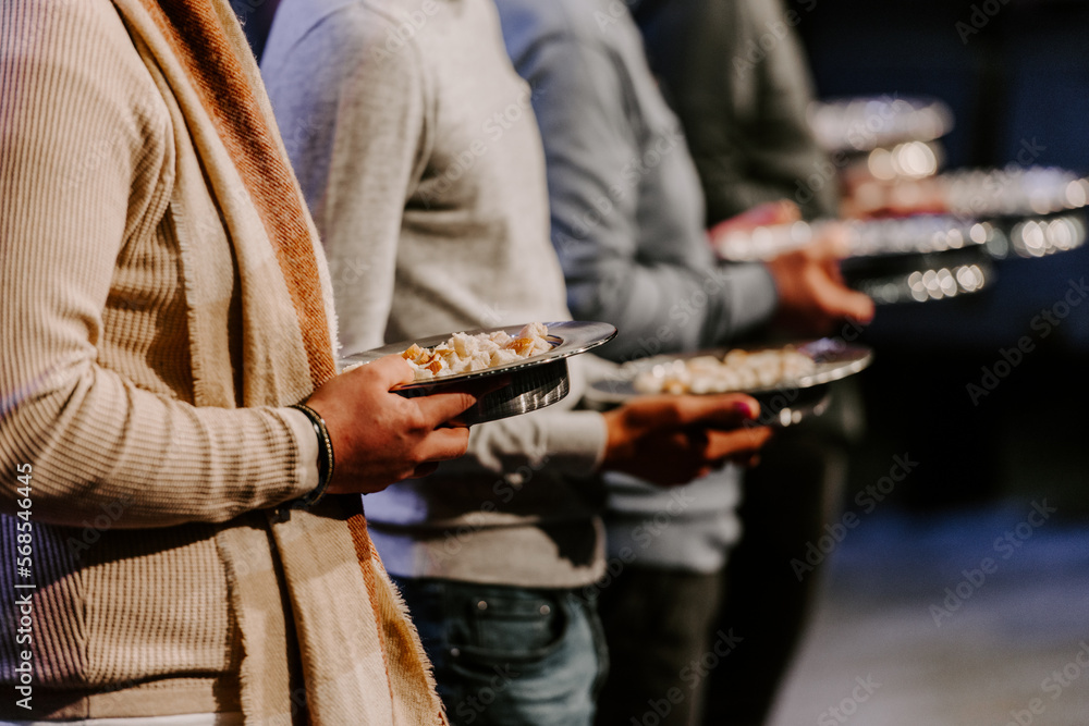 Communion with bread and wine during the service in the assembly