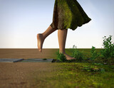 Barefoot woman in a skirt made from moss and grass walking on tiles, stepping from the desert in the green area, only legs visible