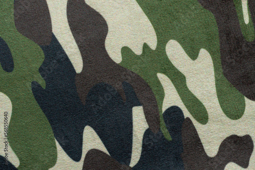 Moro patterned cotton fabric. A fragment of clothing textile in protective colors used in the military as camouflage photo