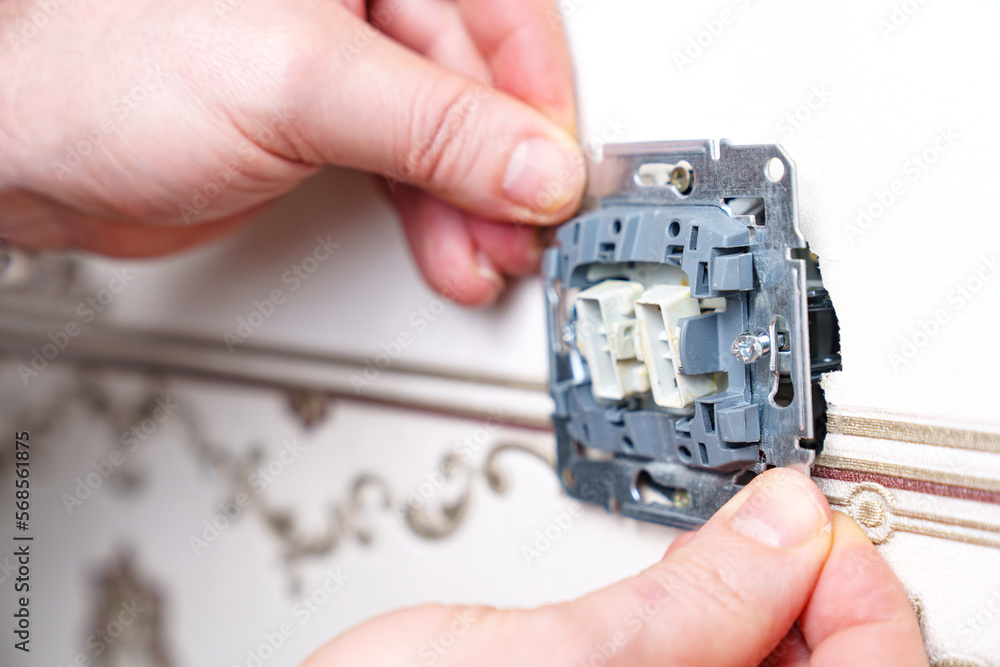 Switch Installtion Installation of a switch. repair of electrical appliances and wiring ...