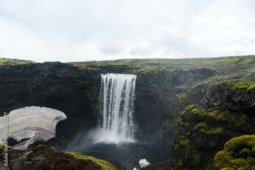 Waterfall in the beautiful landscape in Icelandic environment during cloudy  misty day