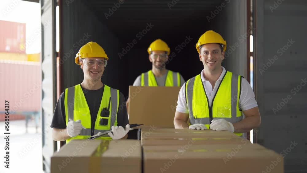 Teamwork of workers working in large warehouse retail store industry.Rack of stock storage. Interior of cargo in ecommerce and logistic concept. Depot. People lifestyle. Shipment service for container Teamwork of workers working in large warehouse retail store industry.Rack of stock storage. Interior of cargo in ecommerce and logistic concept. Depot. People lifestyle. Shipment service for container