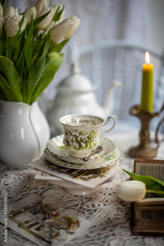 beautiful still life with beautiful trio cup and saucer 'January"