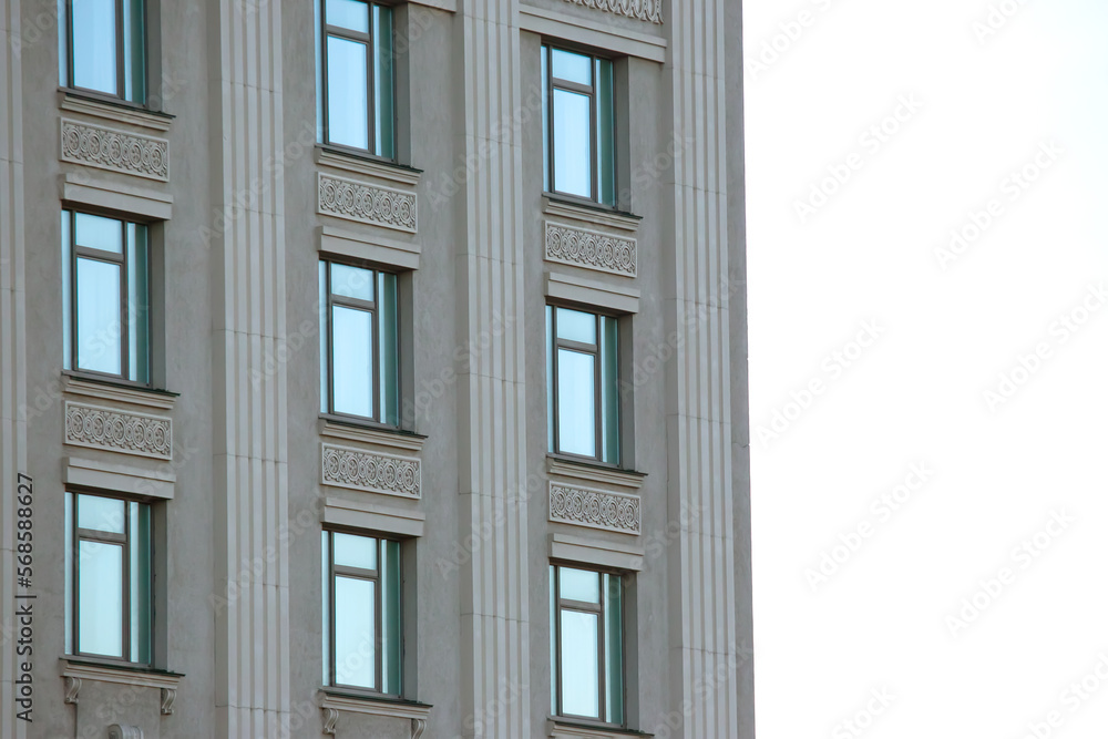 building facade with windows. residential building industry in the city