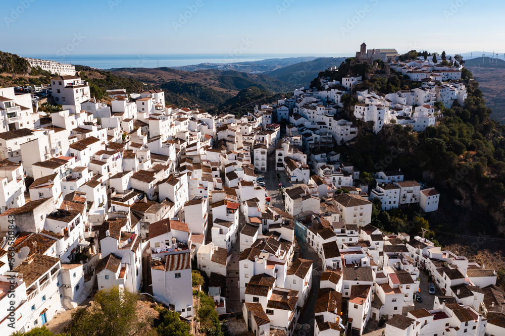 Drone photo of Casares, town in Malga province of Spain. View of buildings on cliffs.