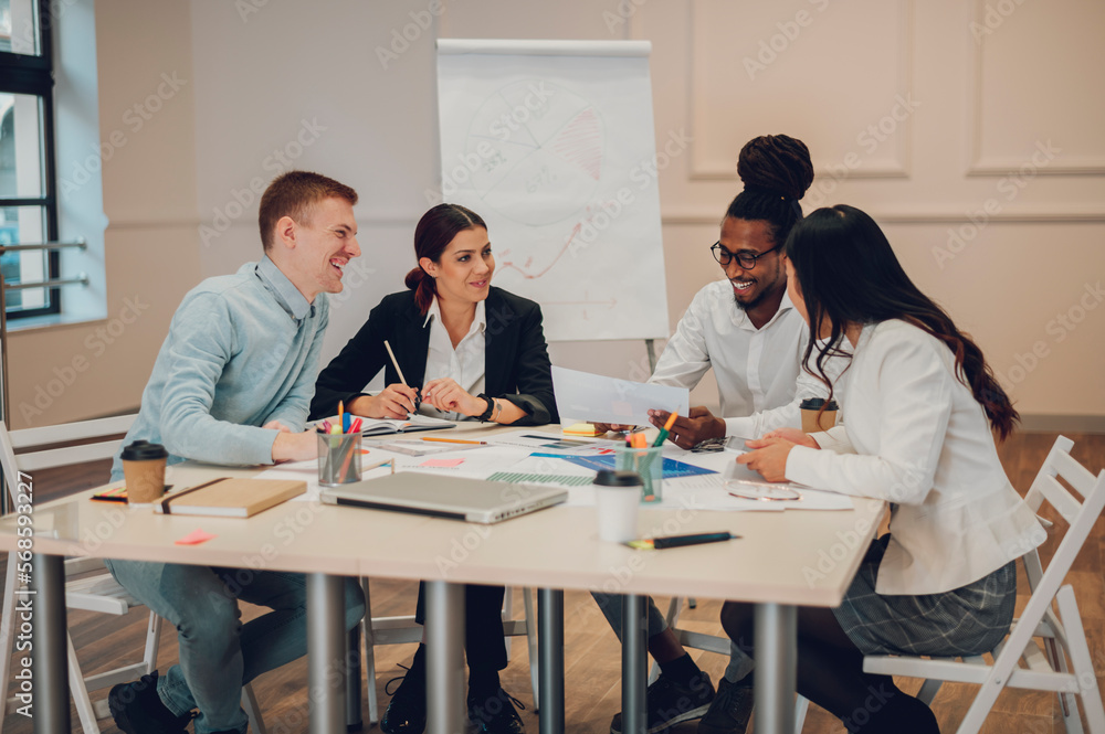 Multiracial business team having a meeting in office Multiracial business team having a meeting in office