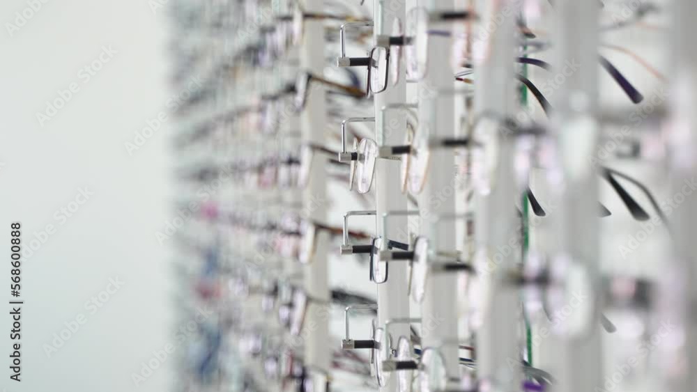 Showcase with glasses in modern optic store Showcase with glasses in modern optic store