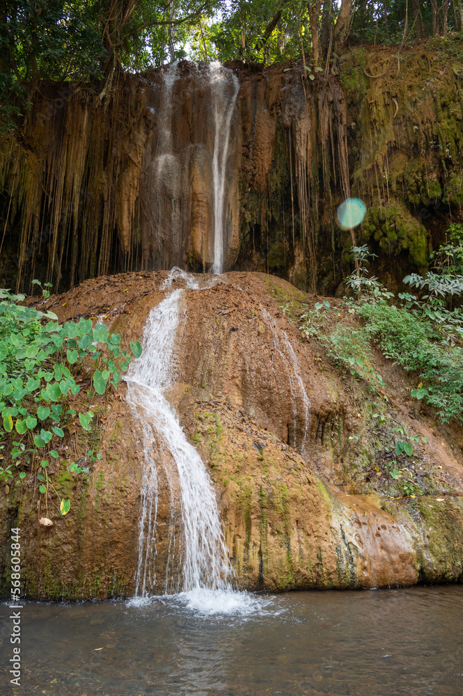 Obraz premium View of Phu Sang waterfall the only one warm waterfall in Thailand with temperature about 35 degrees Celsius. Situated at border of Phayao and Chiang Rai province.