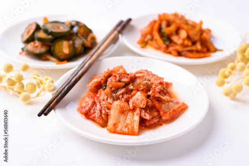 Kimchi cabbage, radish and cucumber on white background, Korean food homemade side dish
