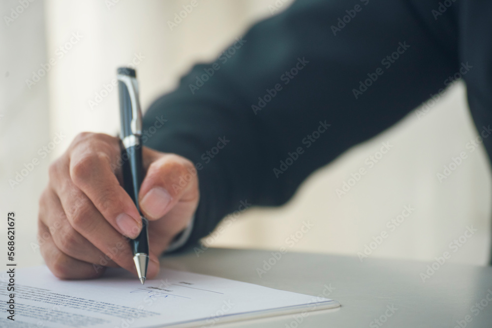 Asian business man using pen signing on new contract to starting projects in conference room. Close up manager businessman hands sign contract working meeting. Business agreement concepts. Asian business man using pen signing on new contract to starting projects in conference room. Close up manager businessman hands sign contract working meeting. Business agreement concepts.
