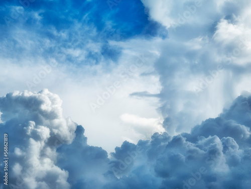 Blue sky fluffy white clouds on summer season bright clear skyline with beautiful cloudscape. Panorama blue sky clouds pattern on daylight with copy space. Cumulus cloudscape air climate sunny day © aFotostock