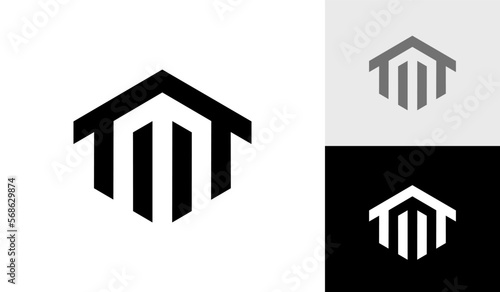 Letter M initial hexagon monogram with house roof logo design vector