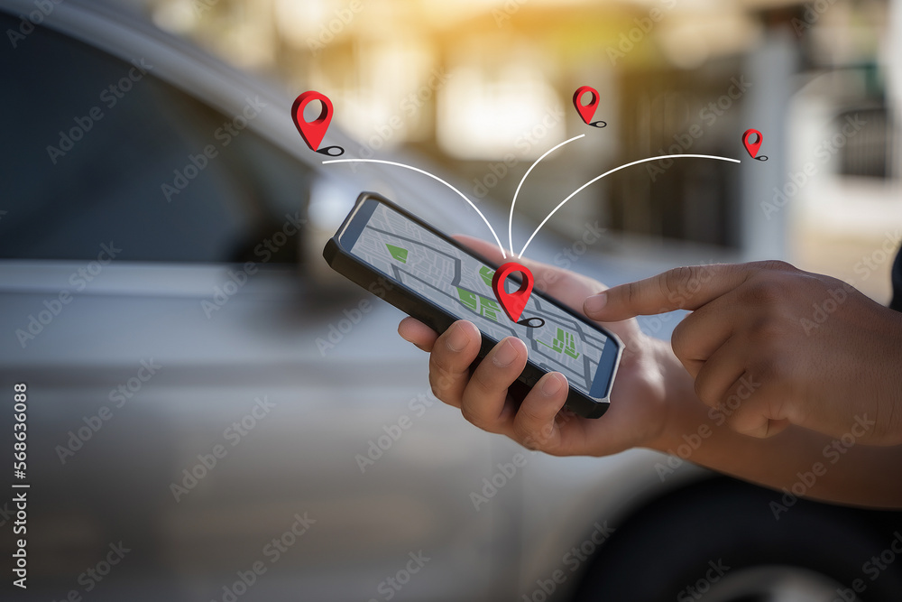 A man makes use of GPS and the internet. online map in the car controls the navigator for GPS tracking. A man makes use of GPS and the internet. online map in the car controls the navigator for GPS tracking.