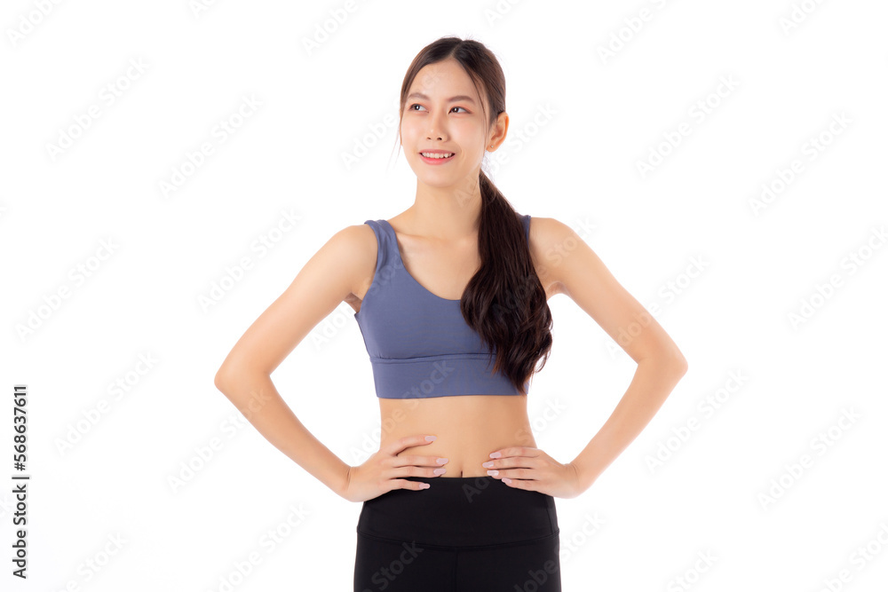 Portrait of beautiful young asian woman in sportwear smile and showing waist and abs isolated on white background, sport and exercise for health, female slimming with confident and wellness Portrait of beautiful young asian woman in sportwear smile and showing waist and abs isolated on white background, sport and exercise for health, female slimming with confident and wellness