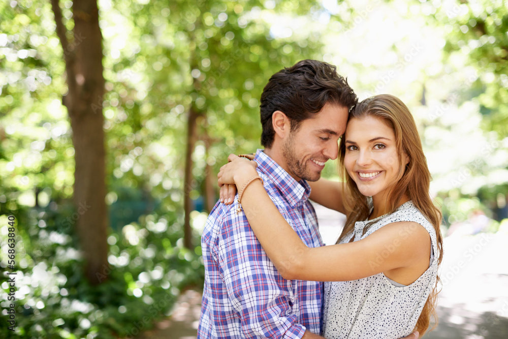 Portrait, hug and couple in a park for date, valentines day and bonding while embracing against a blurred background. Face, love and man hugging woman in nature, excited or romantic outside in Mexico Portrait, hug and couple in a park for date, valentines day and bonding while embracing against a blurred background. Face, love and man hugging woman in nature, excited or romantic outside in Mexico