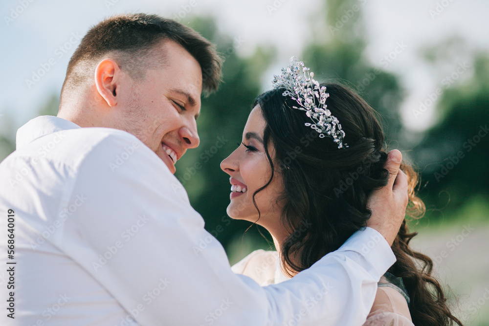 Fototapeta premium Wedding for two on a lavender field. Gorgeous wedding couple.