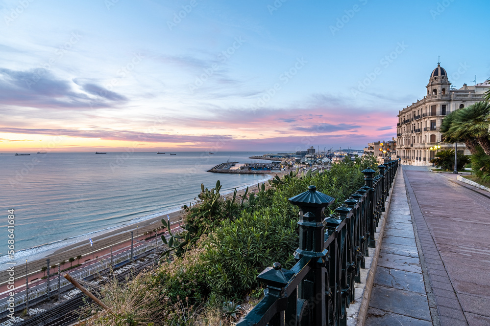 View of the coast and port of Tarragona from Balco del Mediterrani at sunrise