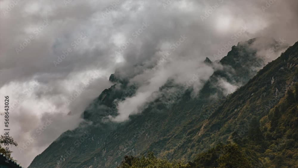 Time lapse of clouds touching mountain peaks along the Annapurna Base Camp Trek in Nepal. Time lapse of clouds touching mountain peaks along the Annapurna Base Camp Trek in Nepal.