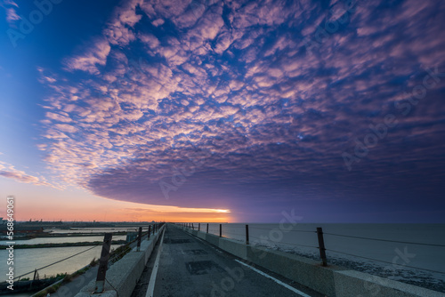 Colorful sunsets on the coast, petrochemical plants on outlying islands. Sixth naphtha cracker, Mailiao Township, Yunlin County, Taiwan