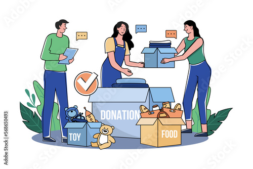 Group of volunteers sorting charity items