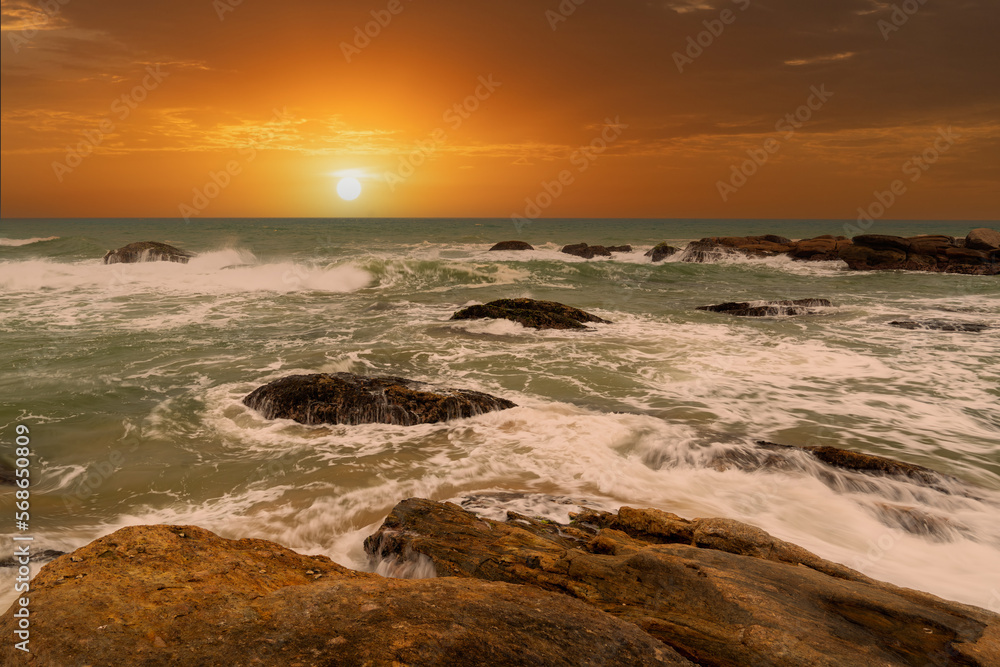 beautiful sunset over the indian ocean with rocks in the foreground sri lanka beautiful sunset over the indian ocean with rocks in the foreground sri lanka