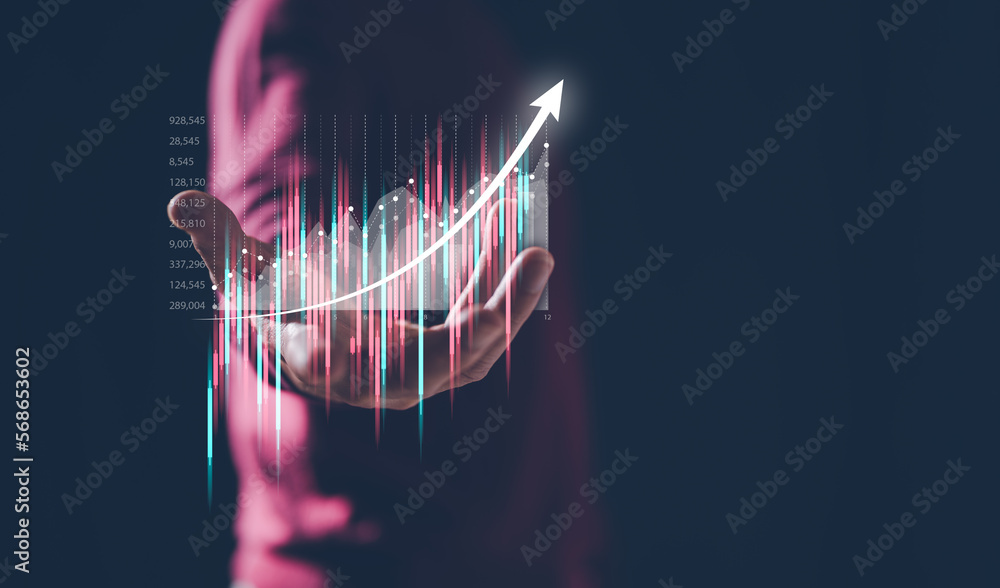 investment and finance concept, businessman holding virtual trading graph  on hand, stock market, profits and business growth. saving and investment plans retirement and fund - obrazy, fototapety, plakaty 